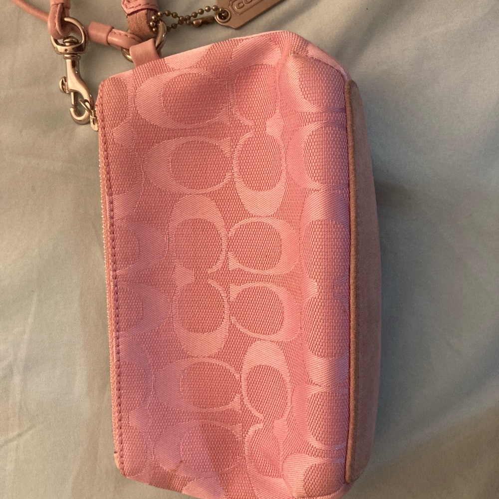 Coach Pink wristlet with Signature Monogram